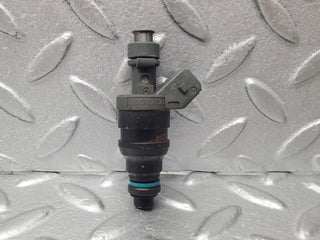 W124 fuel injector used OEM