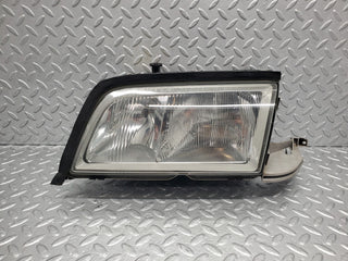 W202 headlight left side used OEM