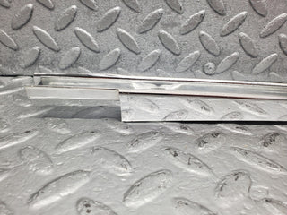 W114 front right chrome window channel used OEM