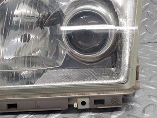 R129 SL xenon headlight left used OEM