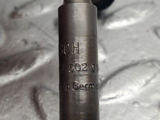 W123 fuel injector used OEM