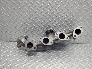 W201 Baby Benz exhaust manifold used OEM