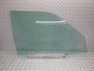 W124 Wagon front right door window glass used OEM