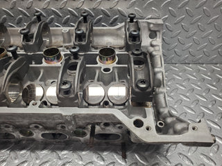 W124 Wagon cylinder head used OEM