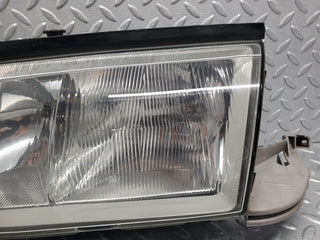 W202 headlight left side used OEM