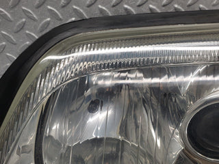 R129 SL xenon headlight left used OEM