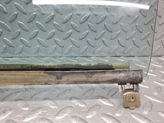 W123 Wagon front right window glass used OEM