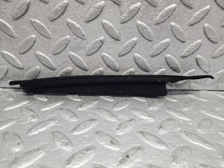 W140 front left door window trim used OEM