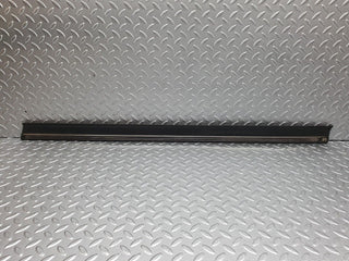 W124 front left door lower moulding trim used OEM