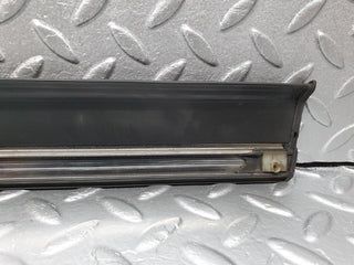 W124 front left door lower moulding trim used OEM
