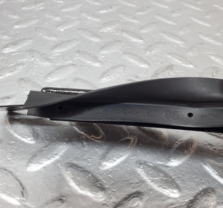 W124 under headlight trim left side used OEM