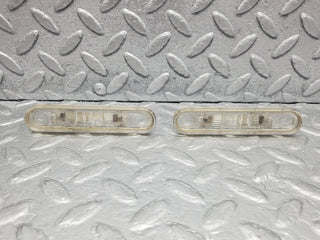 W201 Baby Benz number plate light pair used OEM