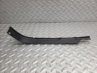 R107 SL headlight lower trim right side used OEM