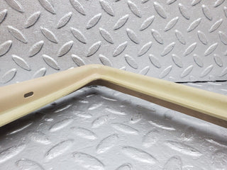 W126 front left door window frame cover used OEM