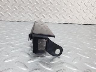 W124 under headlight trim left side used OEM