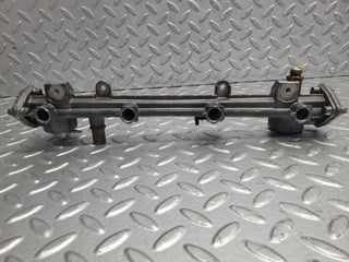 W124 Wagon fuel injector rail used OEM