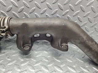 W126 Coupe exhaust manifold left used OEM