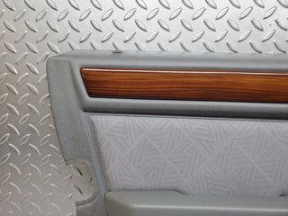 W124 front left door card grey used OEM