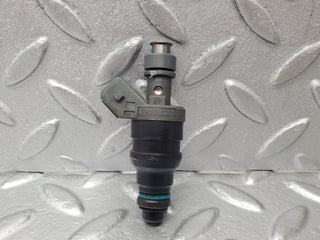 W124 fuel injector used OEM