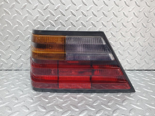 W124 tail light left side used OEM