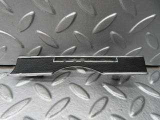 R107 SL dashboard trim left side black used OEM