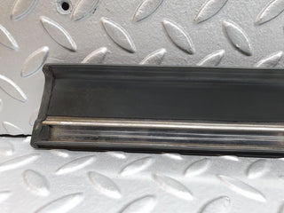 W124 front left door lower moulding trim used OEM