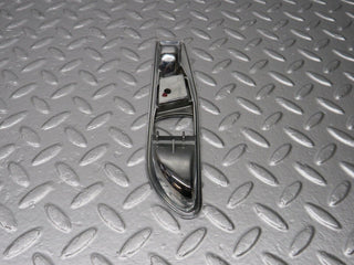 R107 SL interior door handle chrome surround left used OEM