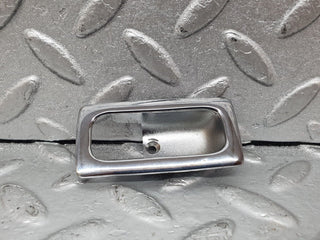 W123 Coupe door lock handle surround chrome used OEM