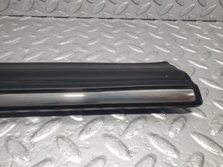 W123 front left door lower moulding trim used OEM