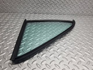 W123 rear left quarter window glass used OEM