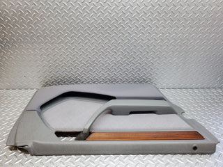 W124 front left door card grey used OEM