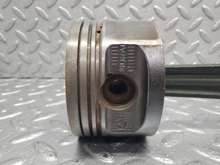 W124 Cabriolet piston with connecting rod used OEM