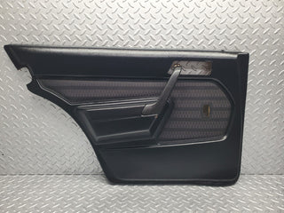 W201 Baby Benz rear left door card black used OEM