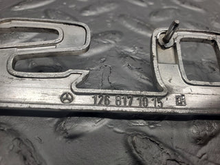 W126 Coupe trunk badge emblem used OEM