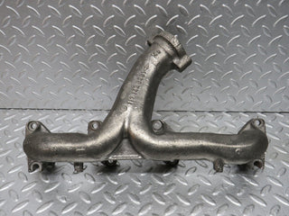 R107 SLC exhaust manifold right side used OEM