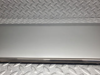 W124 Wagon front left door lower trim used OEM