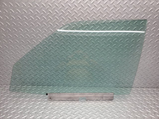 W124 Wagon front left door window glass used OEM