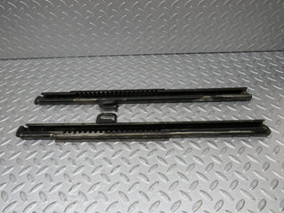 R107 SL front seat rail pair used OEM