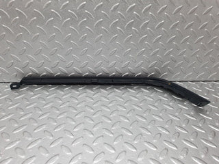 W202 under headlight trim right used OEM