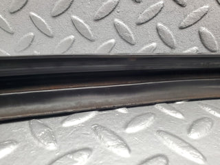 R107 SL front bumper rubber right side used OEM