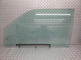 W124 Cabriolet front left door window glass used OEM