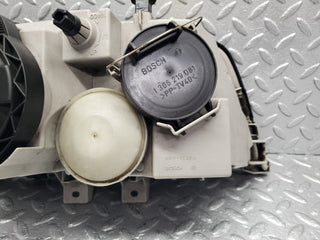 W202 headlight left side used OEM