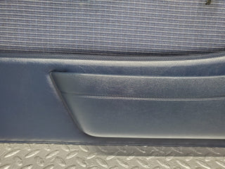 W123 front left door card blue used OEM