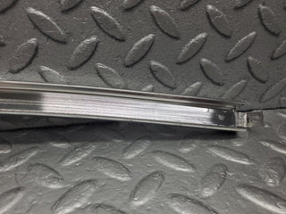 W123 rear right door chrome window channel used OEM