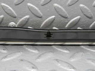 R107 SL left skirt chrome trim strip used OEM