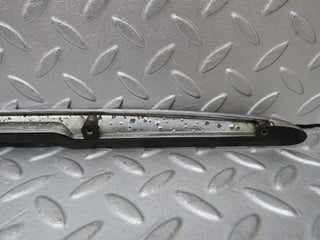 R107 SL trunk chrome handle moulding used OEM