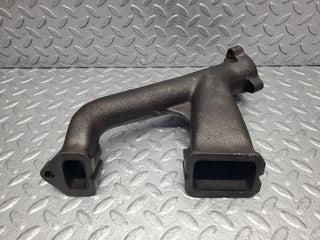 W112 exhaust manifold 4-6 used OEM