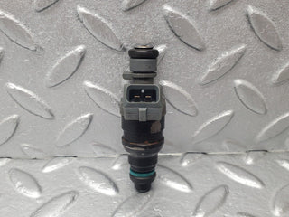 W124 fuel injector used OEM