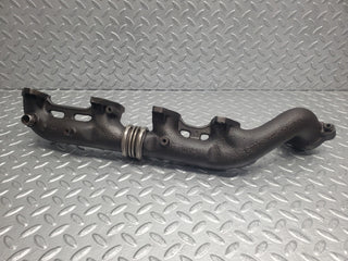 W126 Coupe exhaust manifold left used OEM