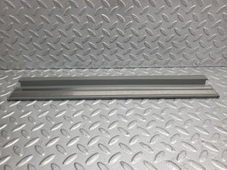 W124 Wagon rear left door sill trim gray used OEM